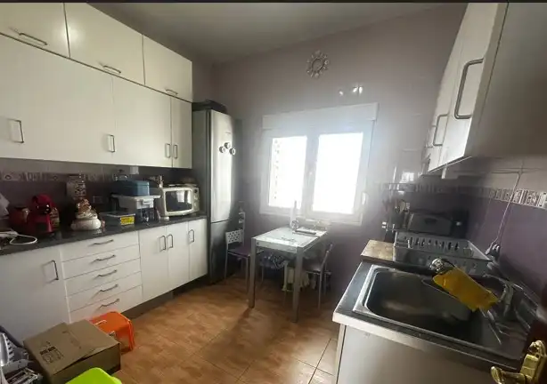 Kitchen of Flat for sale in Gijón   with Heating, Private garden and Furnished