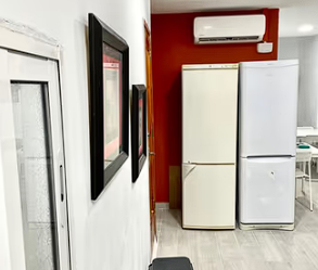 Kitchen of Flat to share in Sueca  with Air Conditioner