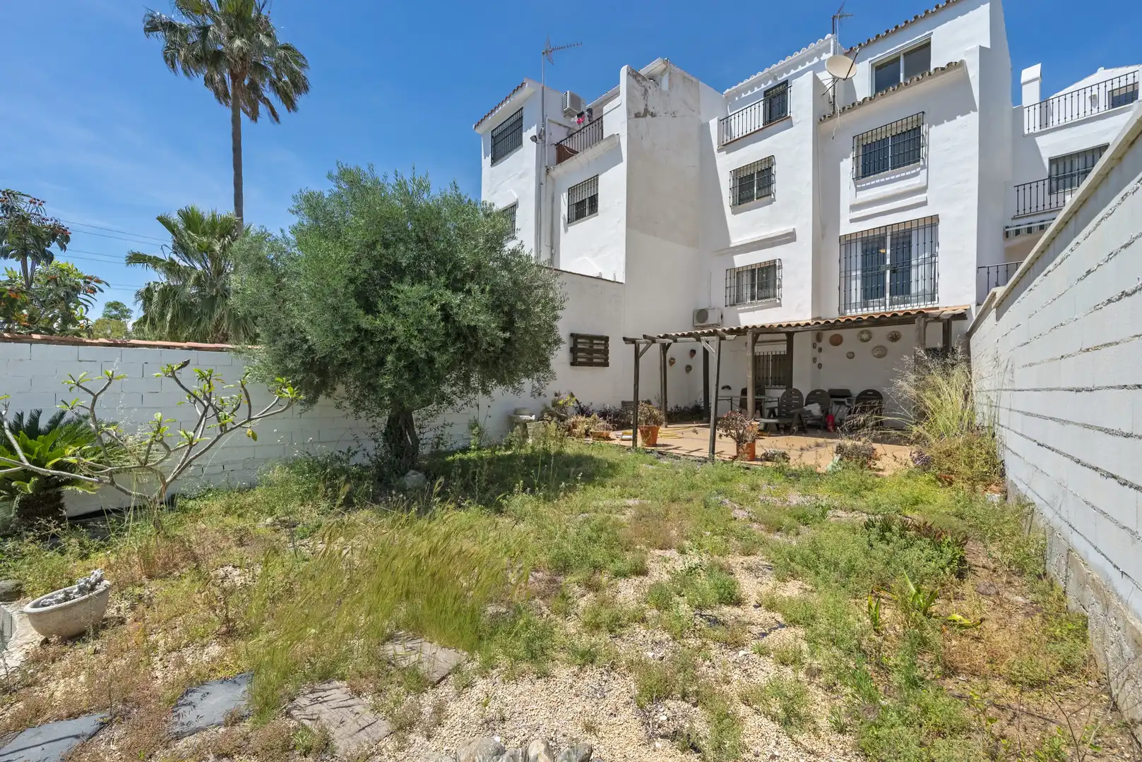 Vista exterior de Casa adosada en venta en Mijas con Aire acondicionado, Jardín privado y Terraza