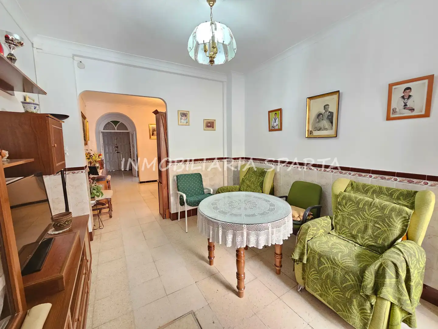 Sala de estar de Casa adosada en venta en Santiponce con Terraza, Trastero y Balcón