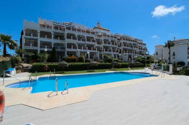 Exterior view of Flat for sale in Mijas  with Air Conditioner, Terrace and Community pool