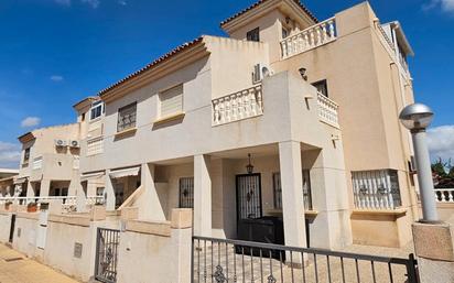 Exterior view of Single-family semi-detached for sale in Torrevieja  with Air Conditioner, Private garden and Terrace