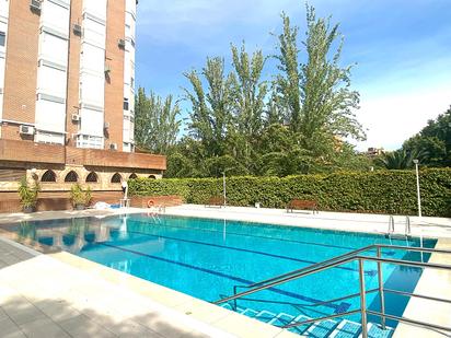 Swimming pool of Flat for sale in  Madrid Capital  with Air Conditioner and Balcony