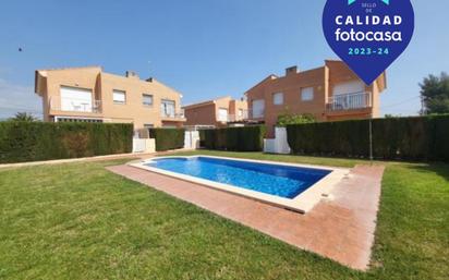 Jardí de Casa adosada en venda en Mont-roig del Camp amb Aire condicionat, Terrassa i Balcó