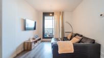 Sala d'estar de Apartament en venda en  Madrid Capital amb Aire condicionat, Jardí privat i Traster