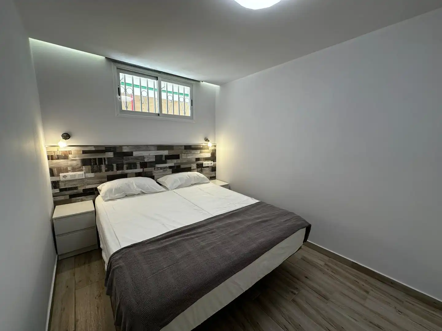 Dormitori de Apartament de lloguer en San Bartolomé de Tirajana amb Calefacció, Moblat i Balcó