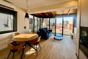 Sala d'estar de Àtic de lloguer en León Capital  amb Aire condicionat, Calefacció i Terrassa