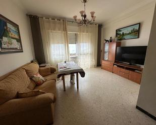 Living room of Single-family semi-detached for sale in Trigueros  with Air Conditioner, Terrace and Balcony