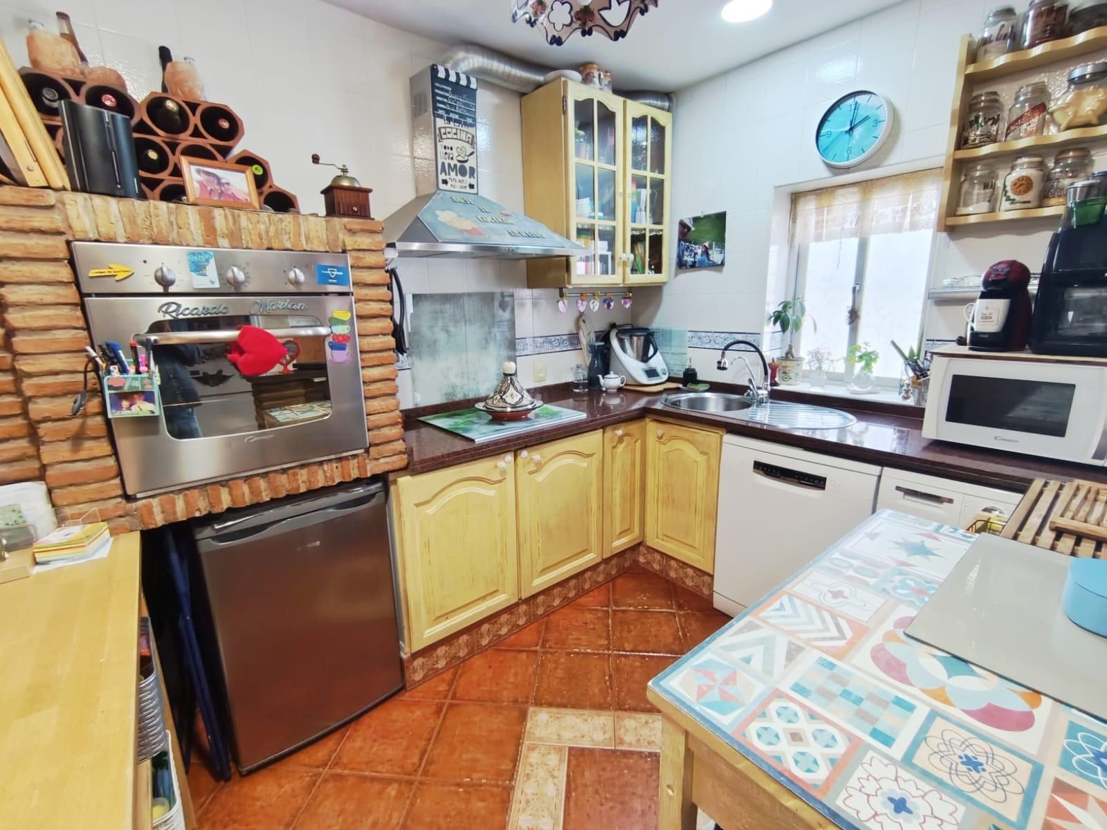 Kitchen of House or chalet for sale in Málaga Capital  with Air Conditioner and Terrace