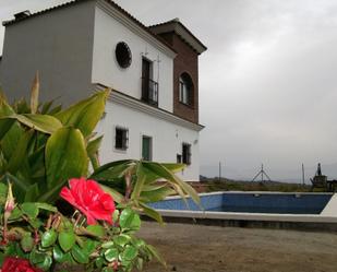 Vista exterior de Finca rústica en venda en Iznate amb Piscina