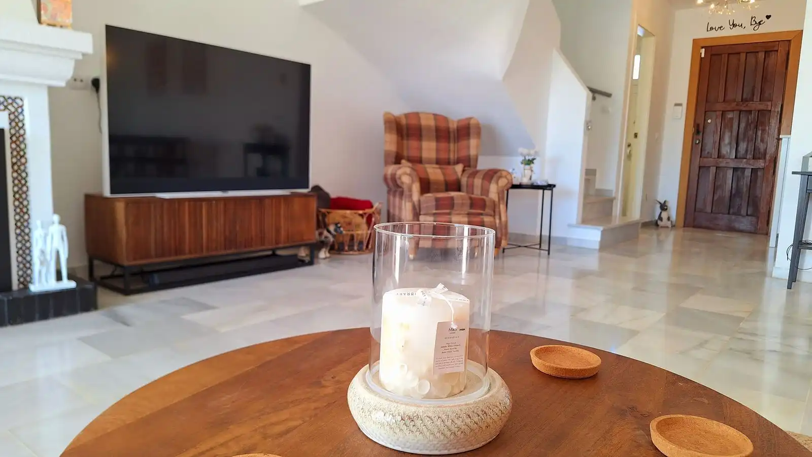 Sala de estar de Casa adosada en venta en Manilva con Aire acondicionado, Terraza y TV