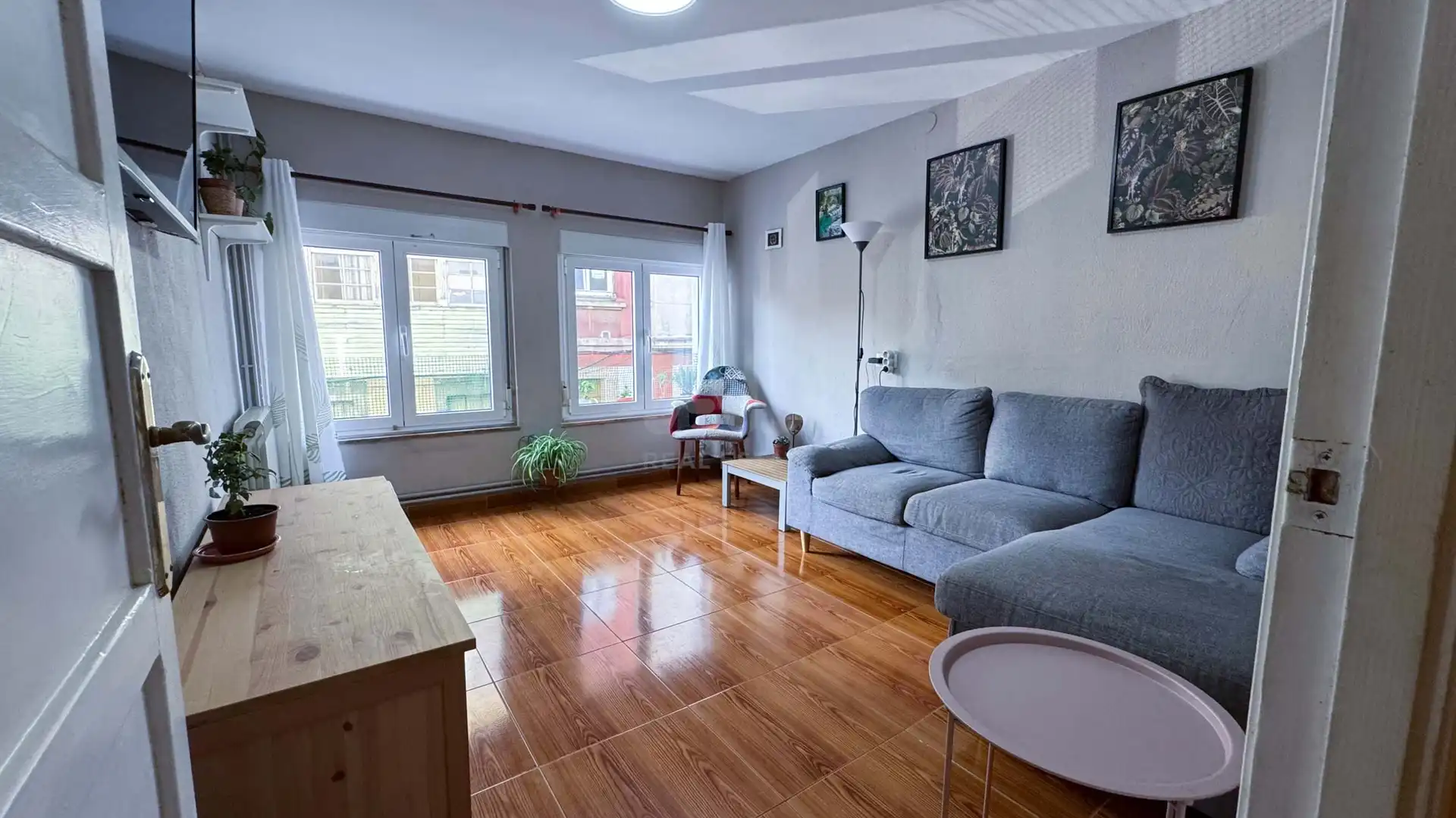 Sala d'estar de Casa adosada en venda en Grado amb Calefacció