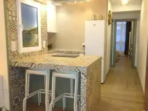 Cuina de Estudi de lloguer en Gijón  amb Calefacció, Parquet i Moblat