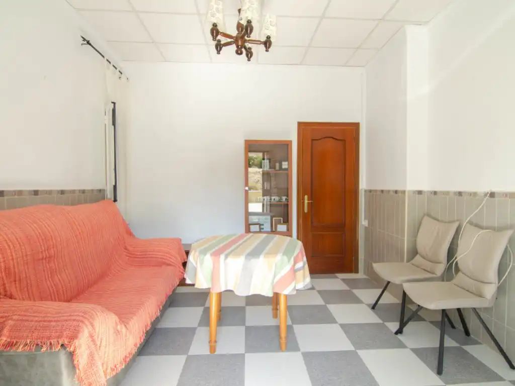 Sala d'estar de Casa o xalet en venda en La Rinconada