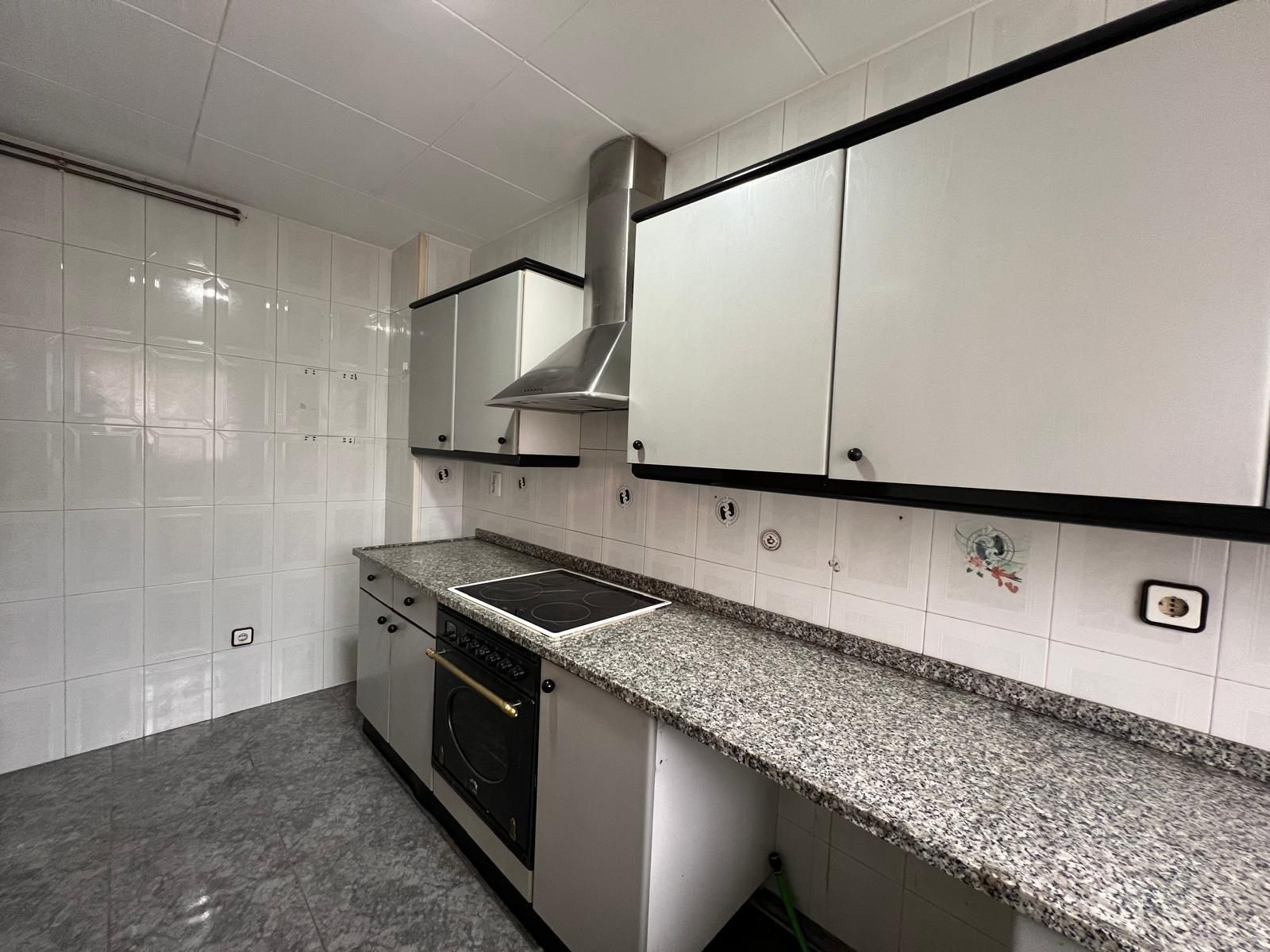 Kitchen of Flat for sale in Sabadell  with Air Conditioner, Terrace and Balcony