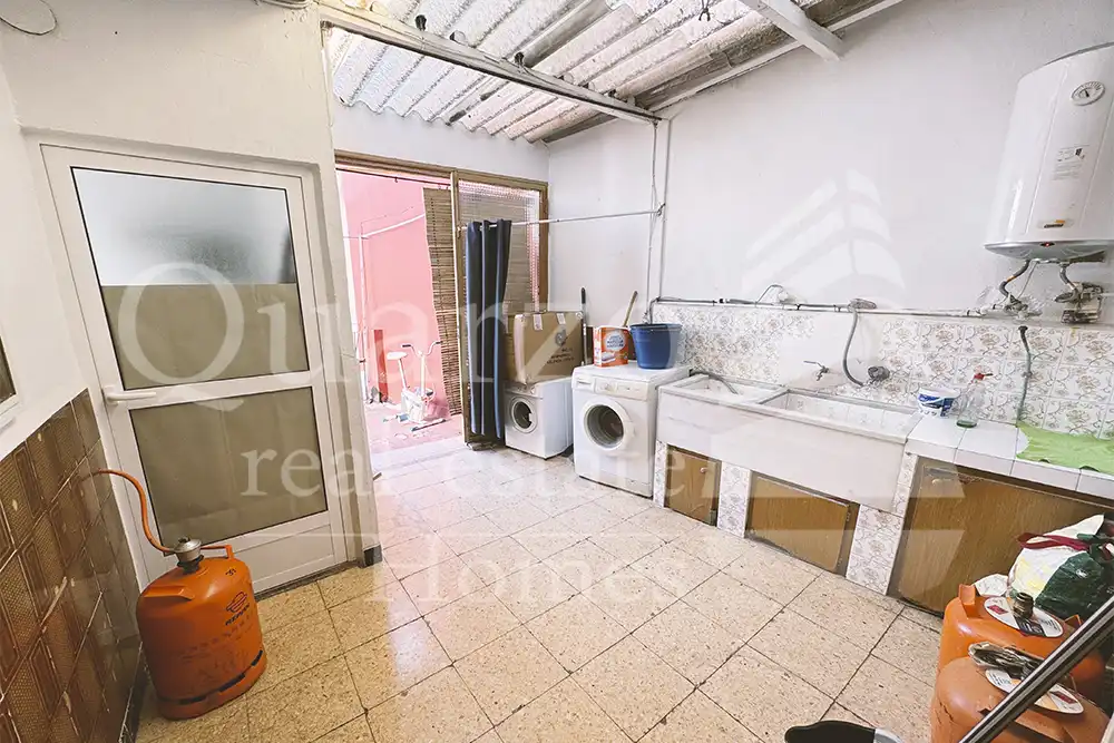 Cuina de Casa adosada en venda en Real amb Traster i Moblat