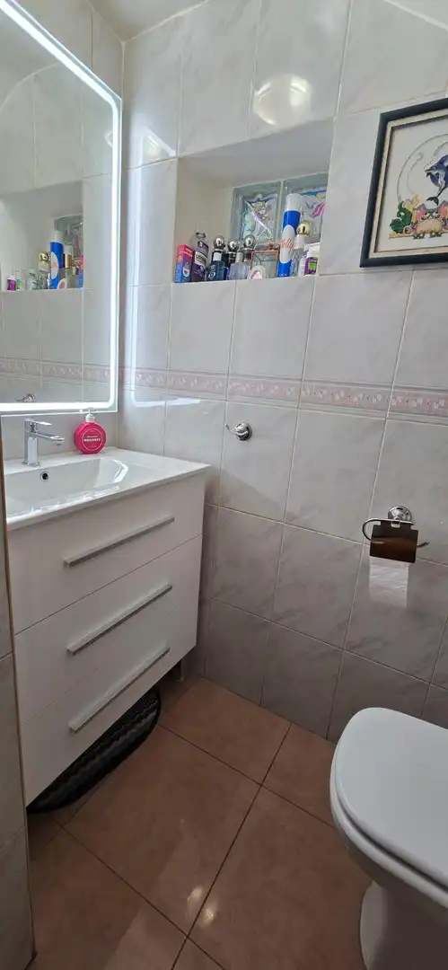 Bany de Casa adosada en venda en Málaga amb Aire condicionat, Calefacció i Jardí privat