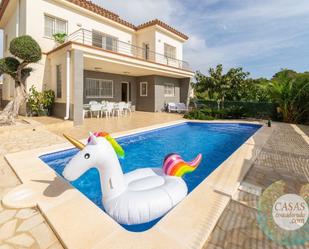 Swimming pool of House or chalet for sale in L'Ampolla  with Air Conditioner, Terrace and Swimming Pool