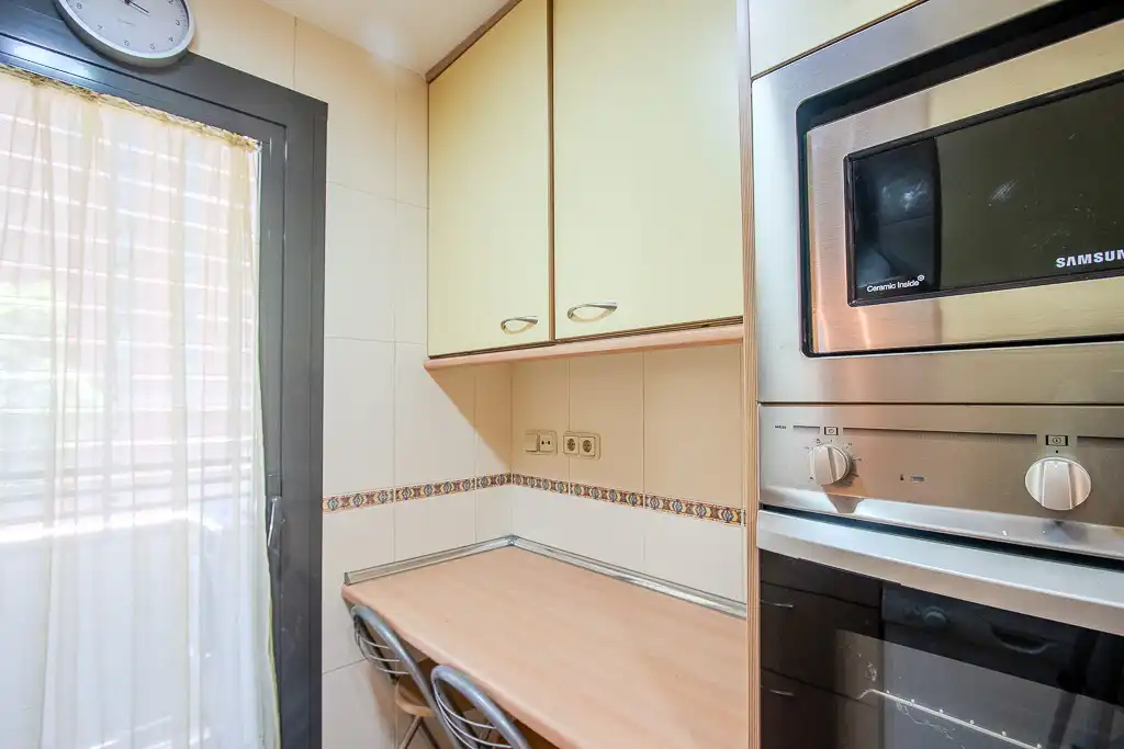 Kitchen of Flat for rent in Madrid  with Air Conditioner, Private garden and Storage room
