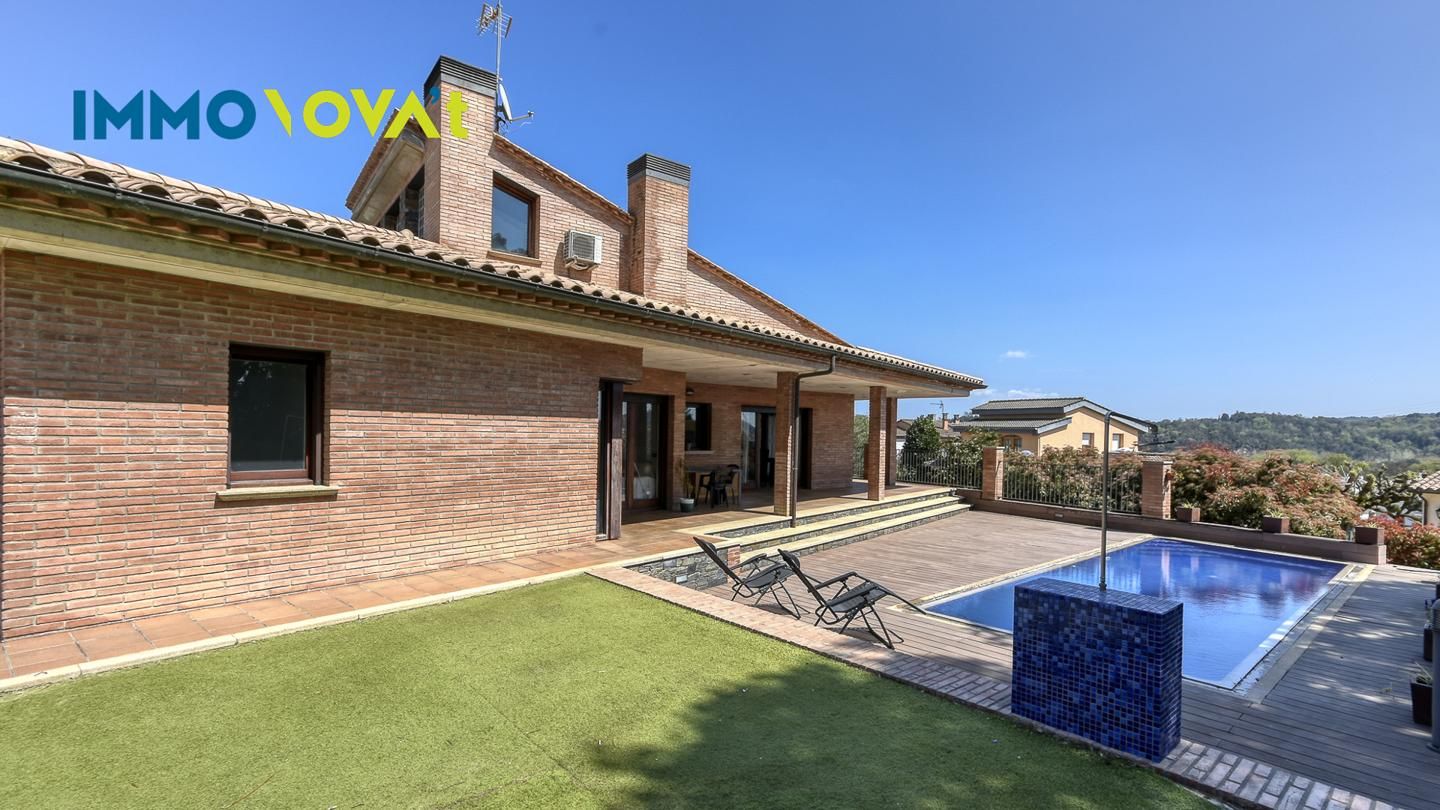 Vista exterior de Casa o xalet en venda en Sant Julià del Llor i Bonmatí amb Aire condicionat, Jardí privat i Terrassa