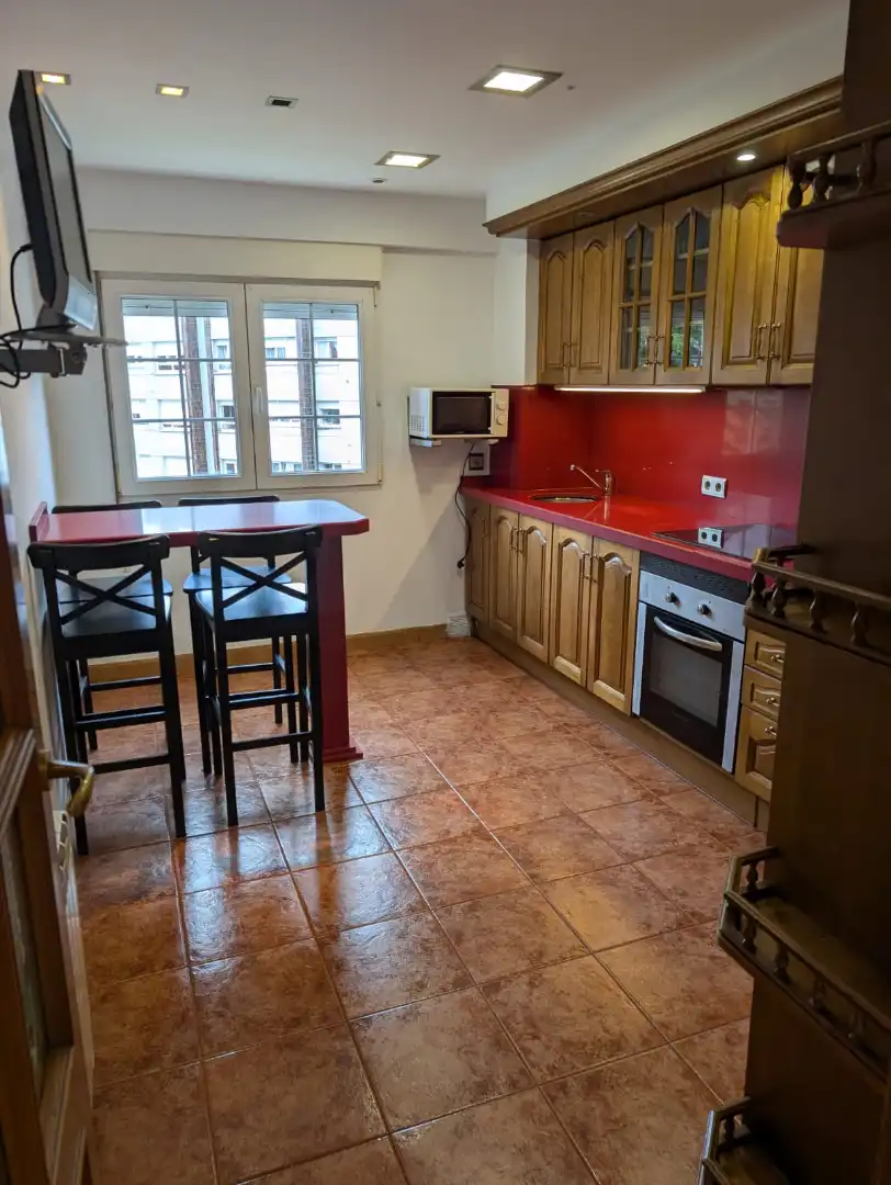 Kitchen of Flat for sale in Gijón   with Heating, Private garden and Parquet flooring