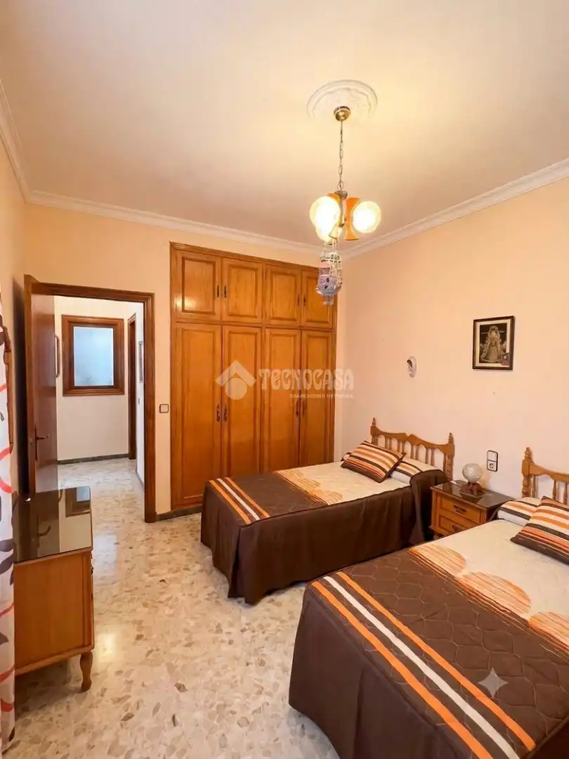 Habitación de Casa adosada en venta en Sevilla con Aire acondicionado y Balcón