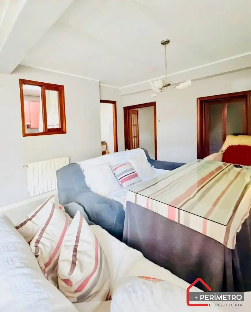 Sala de estar de Casa adosada en venta en Mérida con Aire acondicionado, Calefacción y Terraza
