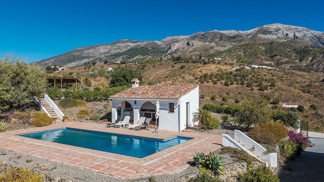 Exterior view of House or chalet for sale in Canillas de Aceituno  with Air Conditioner, Terrace and Swimming Pool