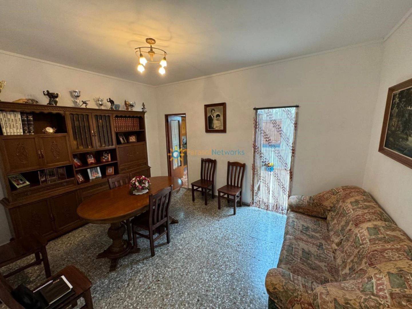 Sala d'estar de Casa adosada en venda en Oliva amb Traster i Moblat