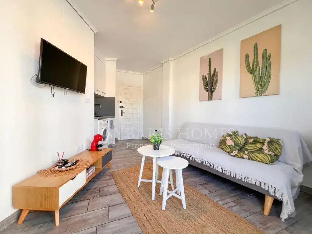 Sala de estar de Apartamento de alquiler en Dénia con Aire acondicionado, Jardín privado y Piscina