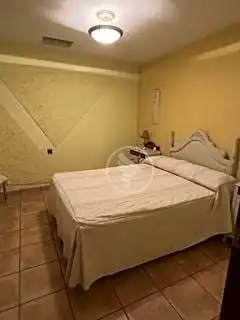 Dormitori de Casa o xalet en venda en Linares amb Aire condicionat, Jardí privat i Terrassa