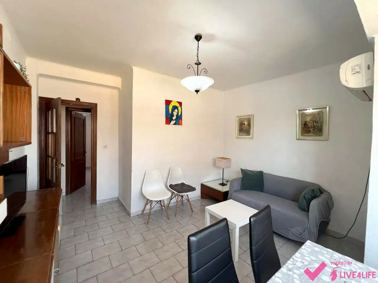 Sala de estar de Piso para compartir en Sevilla con Aire acondicionado, Calefacción y Amueblado