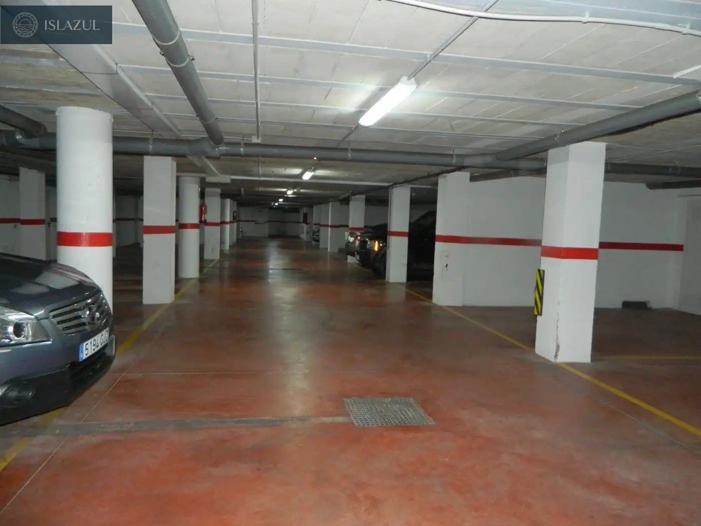 Parking de Dúplex de alquiler en Isla Cristina con Terraza, Balcón y Piscina comunitaria