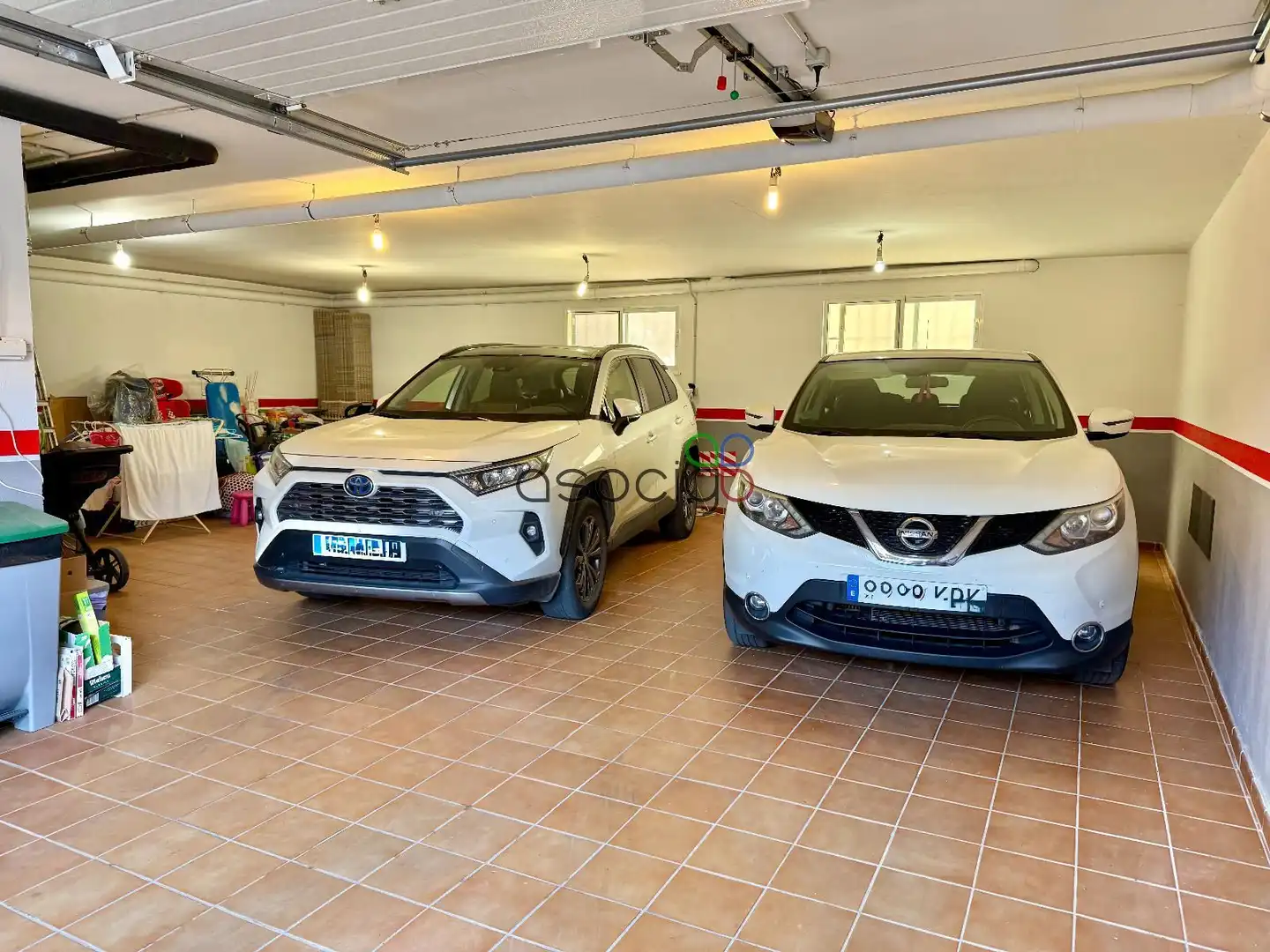 Parking de Casa adosada en venta en Cabanillas del Campo con Aire acondicionado, Calefacción y Jardín privado