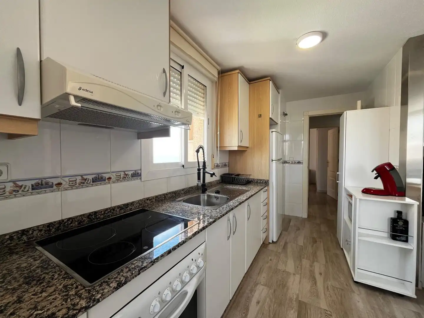 Kitchen of Flat for sale in La Manga del Mar Menor  with Air Conditioner, Private garden and Furnished