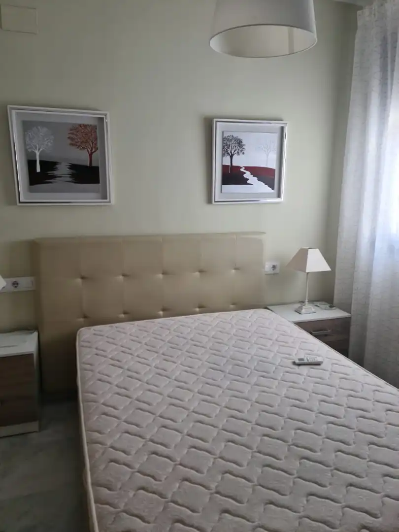 Dormitori de Apartament de lloguer en Écija amb Aire condicionat, Calefacció i Moblat