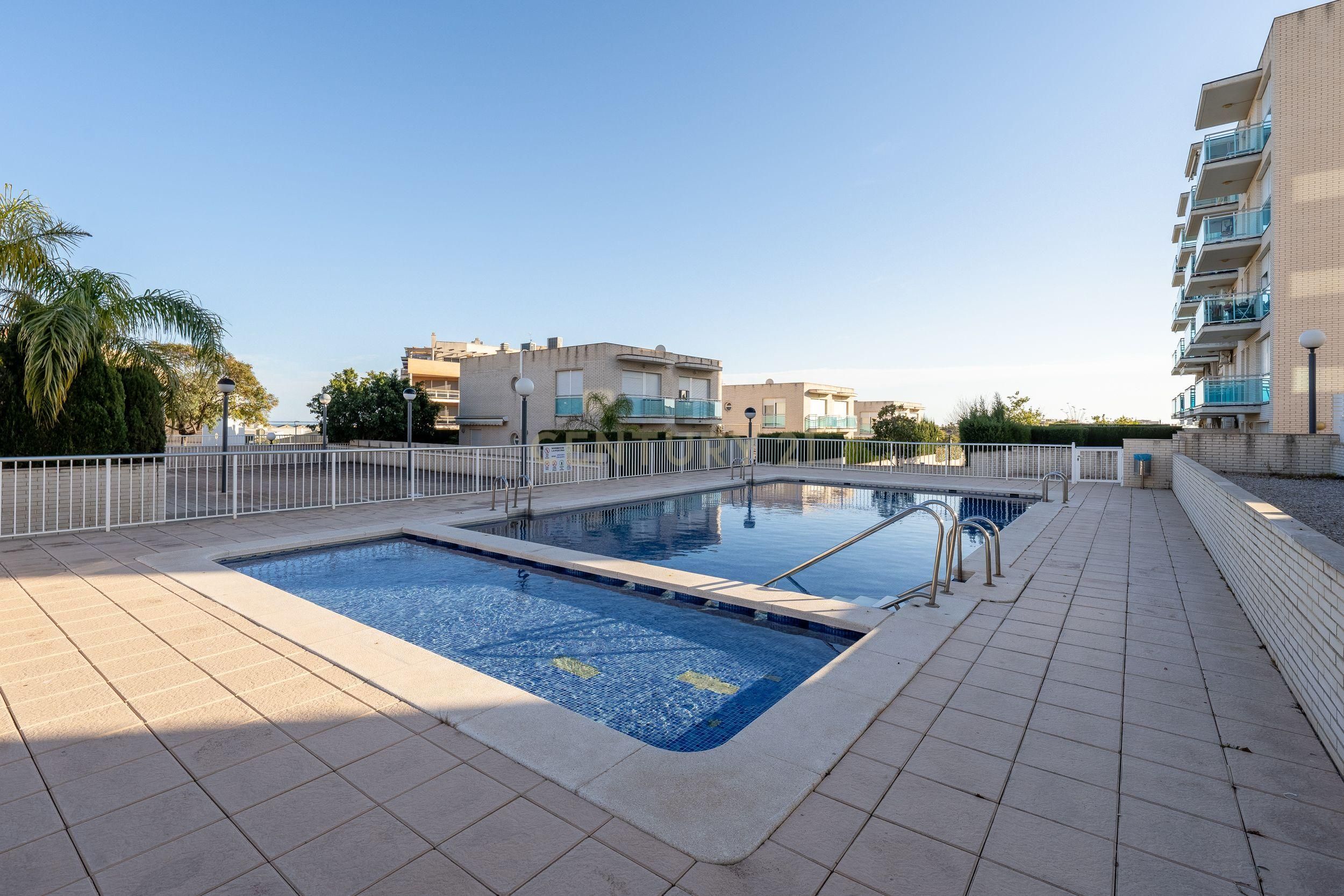 Piscina de Casa adosada en venda en Sant Carles de la Ràpita amb Aire condicionat, Jardí privat i Moblat