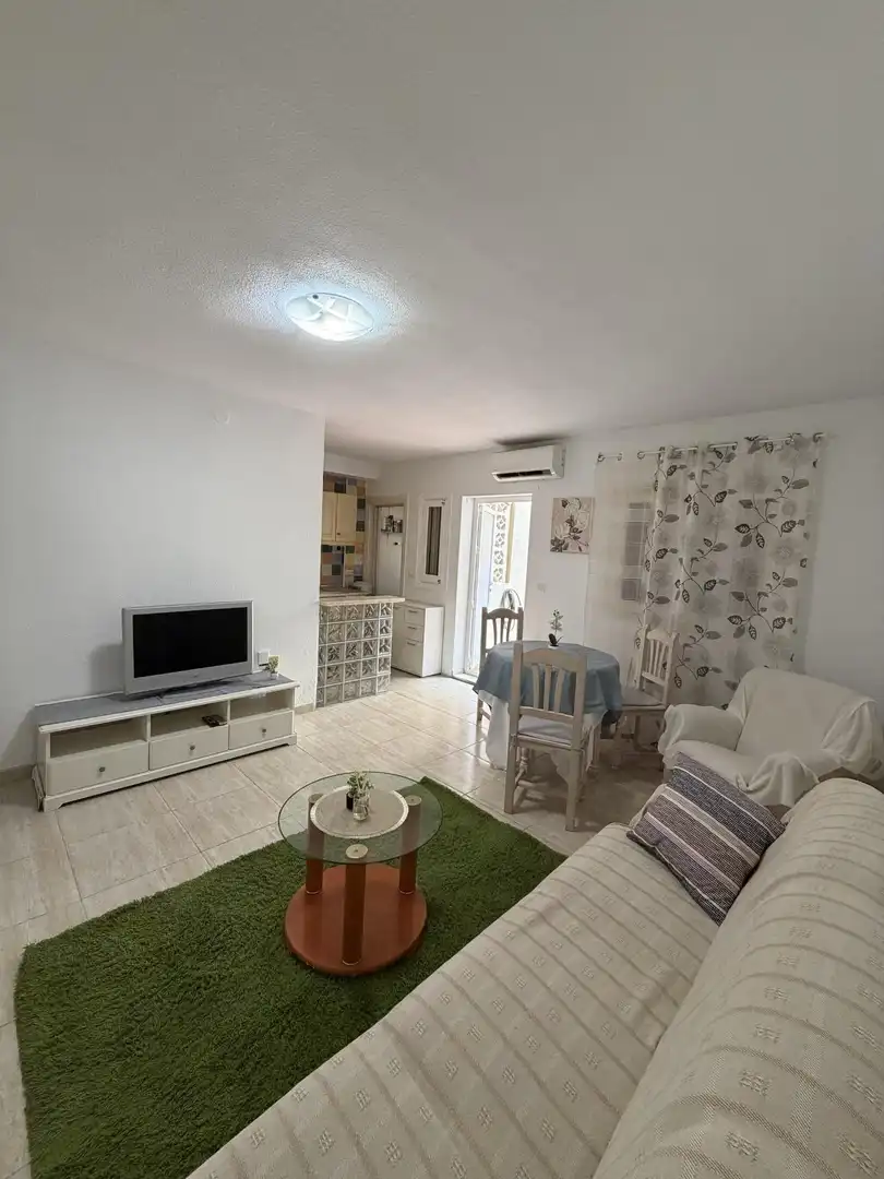 Sala de estar de Planta baja en venta en Orihuela con Jardín privado, Terraza y Amueblado