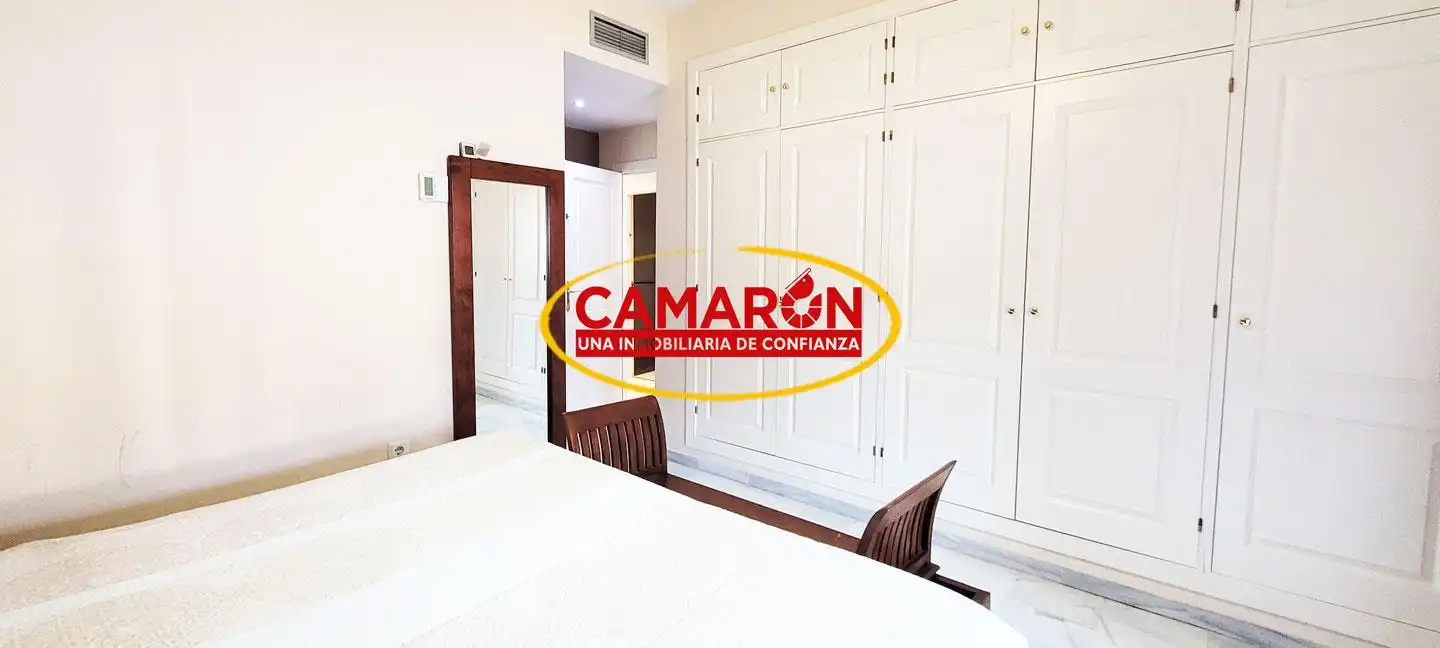 Habitación de Casa adosada en venta en Coria del Río con Aire acondicionado