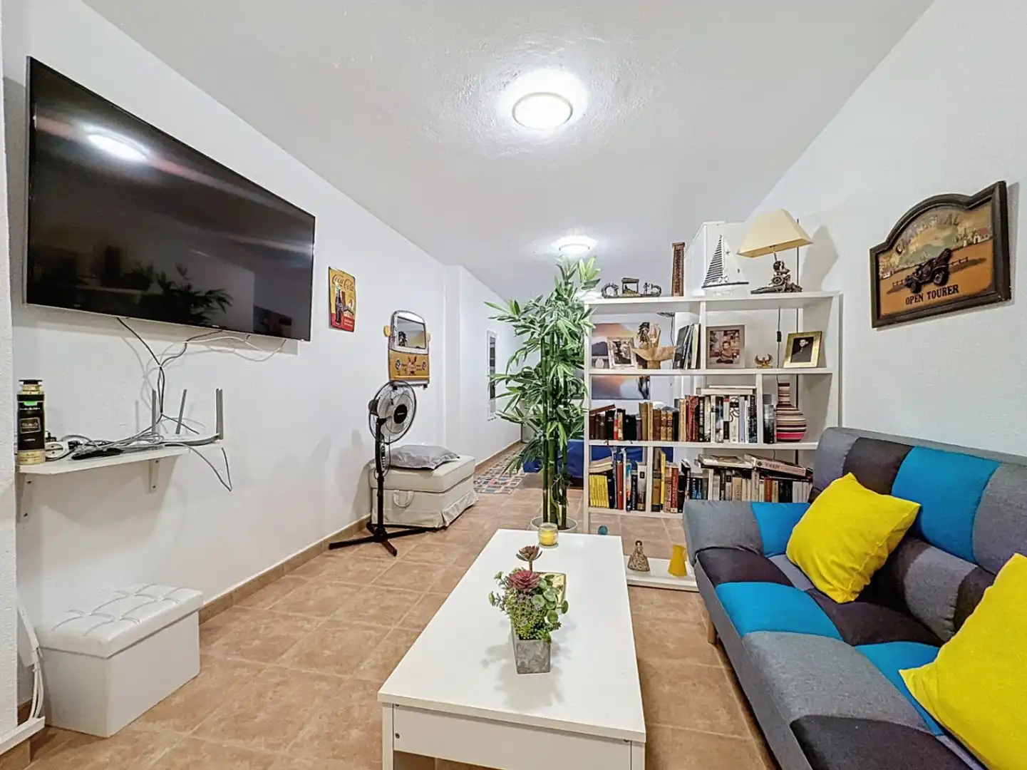 Sala d'estar de Casa adosada en venda en L'Alfàs del Pi amb Aire condicionat, Jardí privat i Terrassa