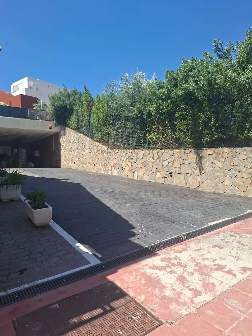 Aparcament de Casa adosada en venda en Benalmádena amb Aire condicionat, Terrassa i Traster