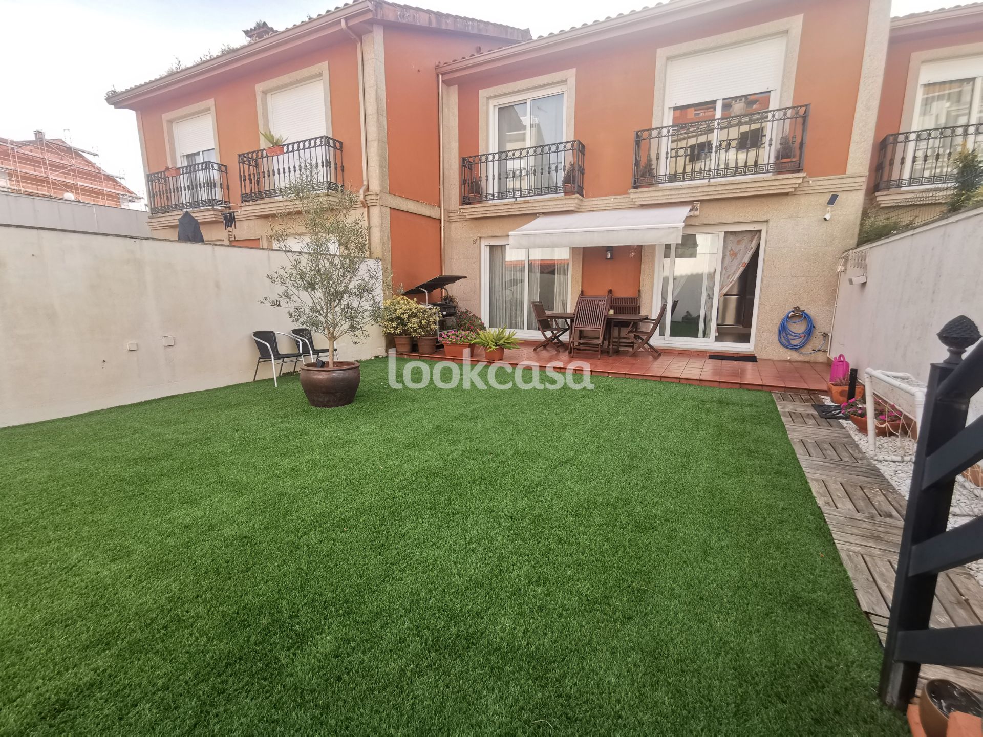 Terrassa de Casa adosada en venda en Sanxenxo amb Calefacció, Jardí privat i Parquet
