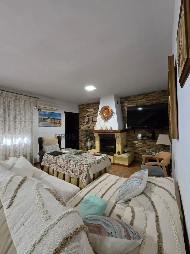 Sala de estar de Casa adosada en venta en La Victoria con Aire acondicionado, Calefacción y Jardín privado