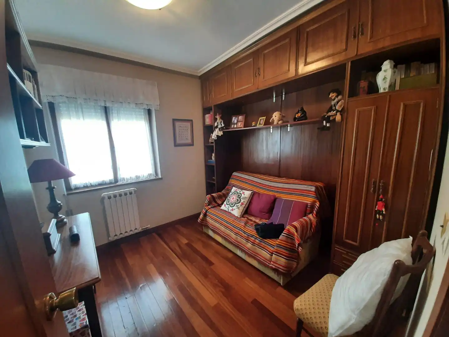 Sala de estar de Casa adosada en venta en Villaquilambre con Calefacción, Jardín privado y Terraza