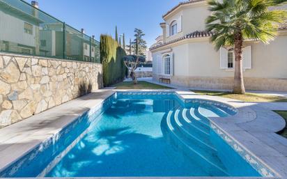 Swimming pool of House or chalet for sale in  Granada Capital  with Air Conditioner, Terrace and Swimming Pool