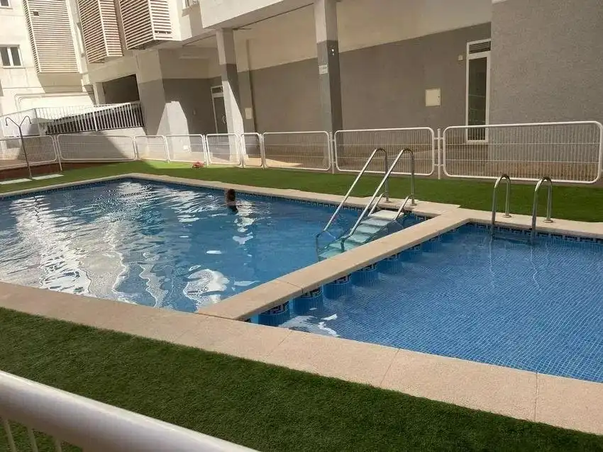 Swimming pool of Flat for sale in Alicante / Alacant  with Air Conditioner, Heating and Parquet flooring