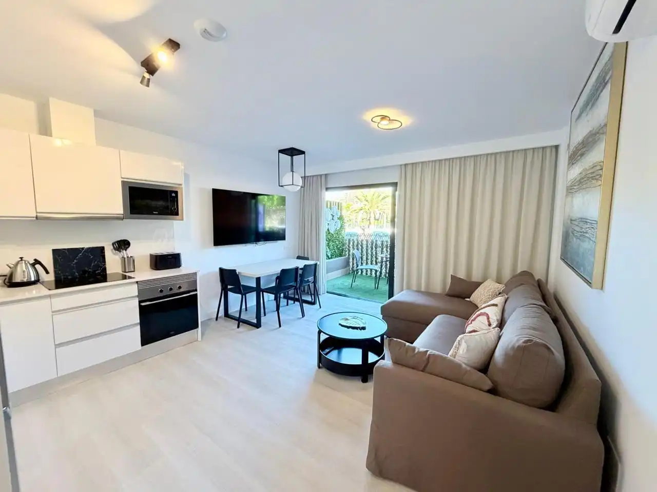 Living room of Flat for rent in Mogán  with Air Conditioner, Terrace and Furnished