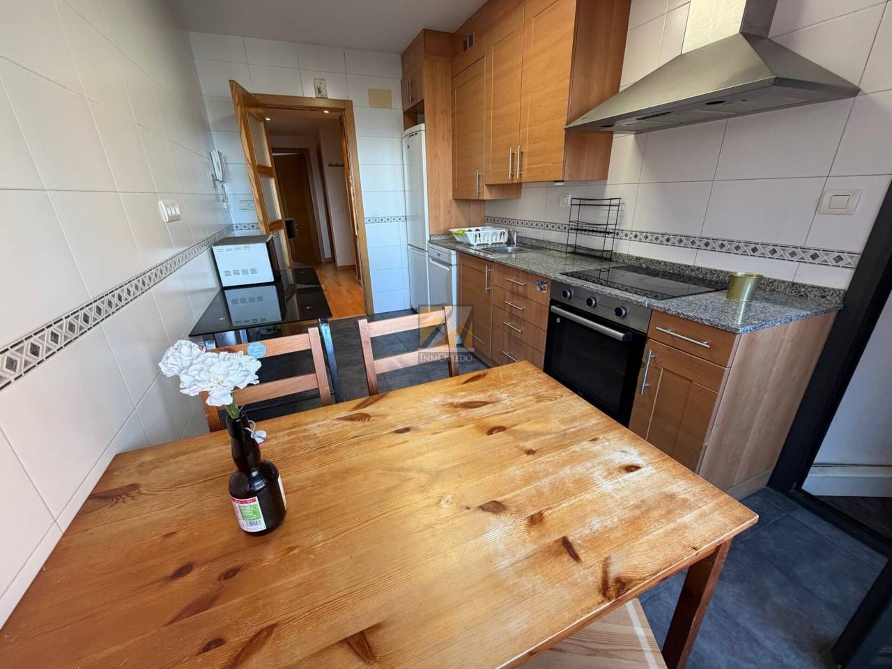 Kitchen of Flat for sale in Oviedo   with Heating, Parquet flooring and Storage room