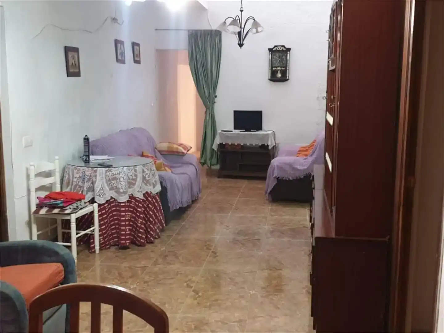 Sala d'estar de Casa adosada en venda en Alboloduy amb Moblat