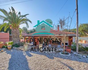 Vista exterior de Casa o xalet en venda en Busot amb Aire condicionat, Calefacció i Jardí privat